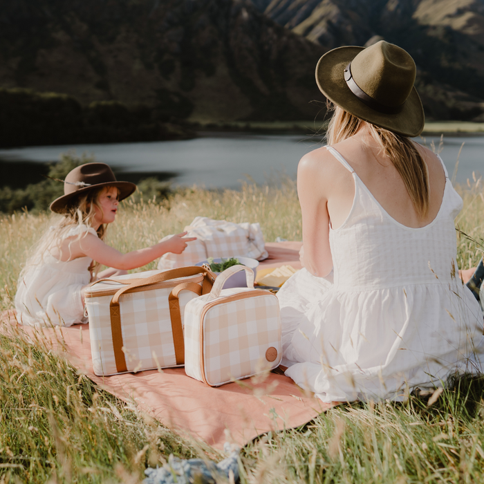 mother and daughter on a picnic play date